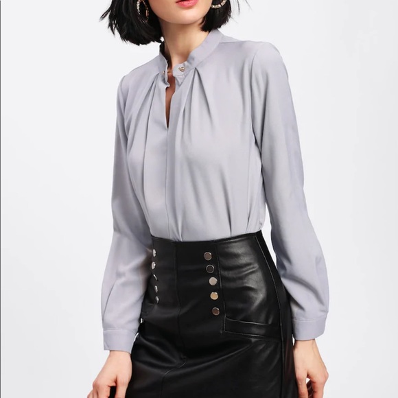 Super cute silky blouse with metal button front. - Picture 1 of 4